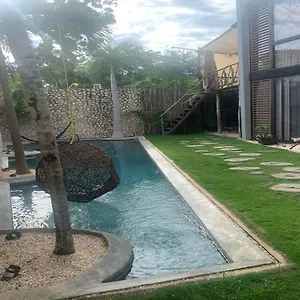 https://ariche-tulum-hotel-hostal.allrivieramayahotels.com